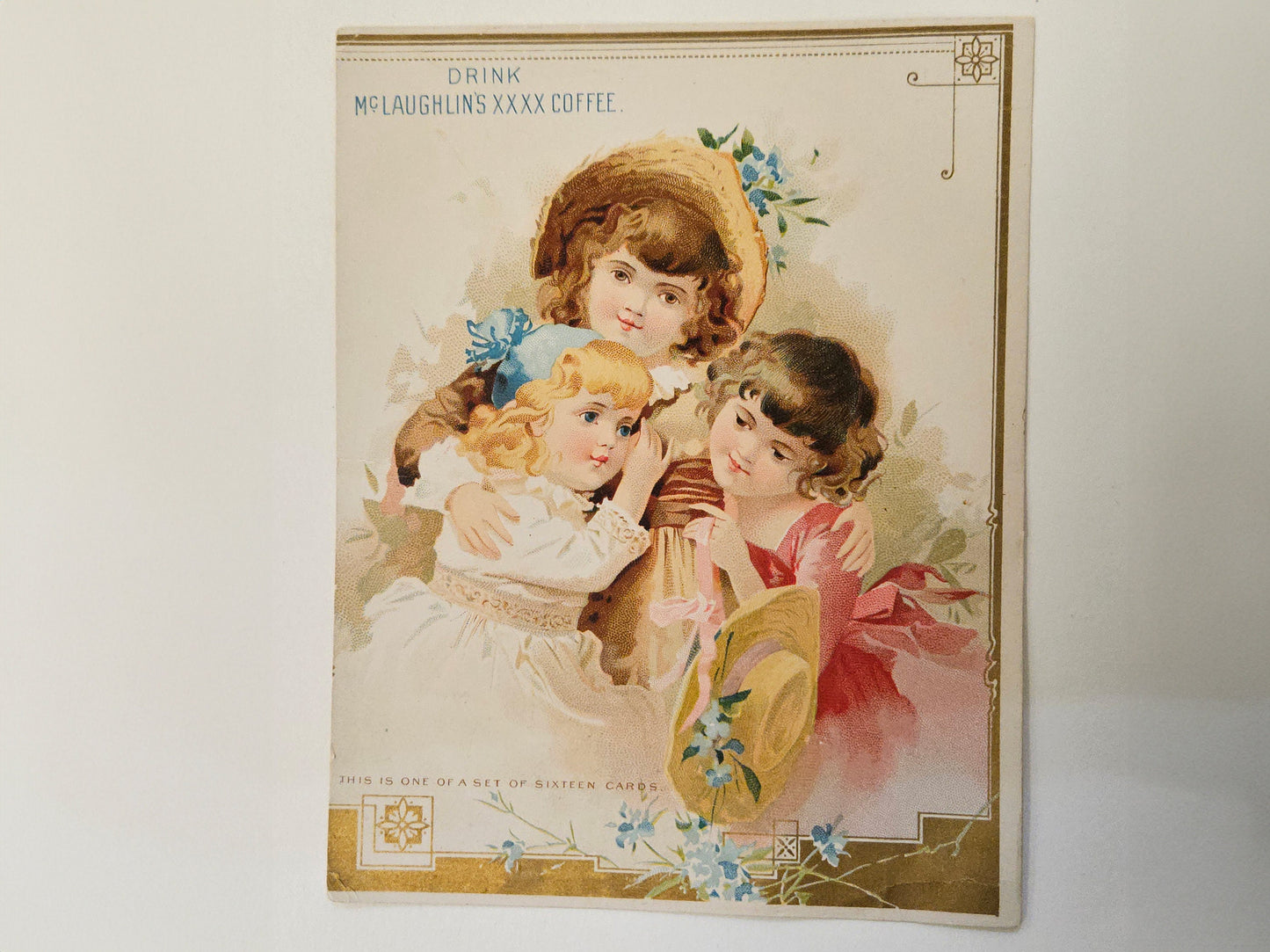 McLaughlin's Coffee Trade Card Advertisement- RARE Trade Card - Chicago Illinois - Three Young Girls Dressed Up for Spring with Blue Flowers