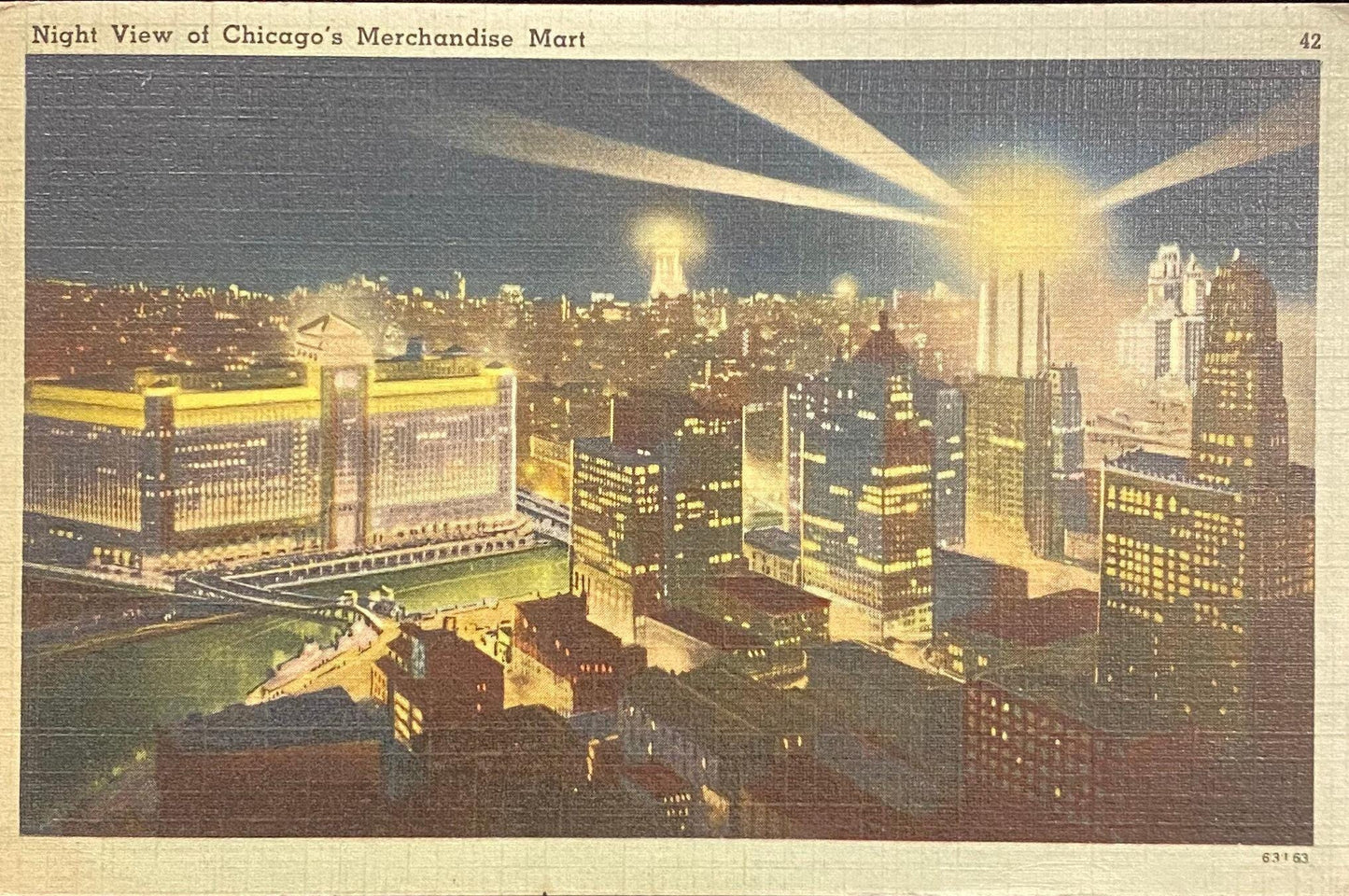 Night View of Chicago's Merchandise Mart - 1940s Linen Postcard