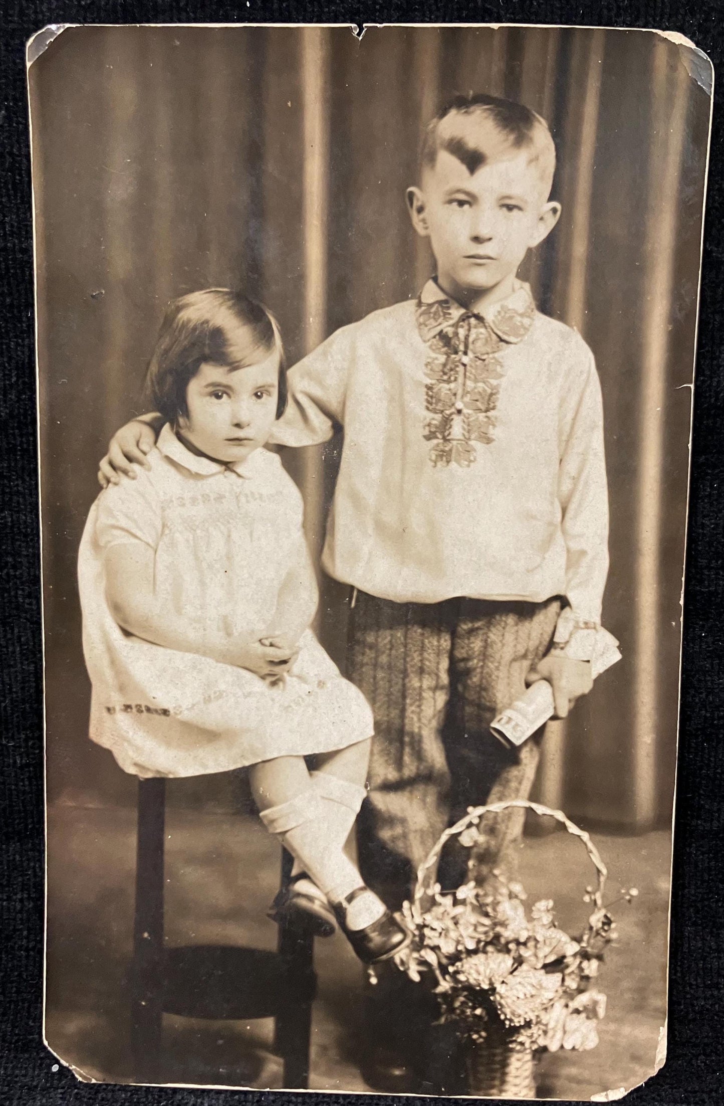 RPPC - Formal Photo of Brother and Sister with Floral Basket - Late 1920s Real Photo postcard - Perhaps used as a Holiday Photo Card