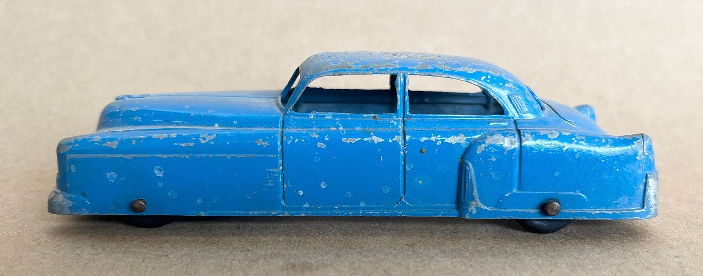 1948 GM Cadillac- Tootsie Toy- 6" long tootsie toy Cadillac - 1:43 Blue Cadillac - All Paint and Tires Original - Played with condition