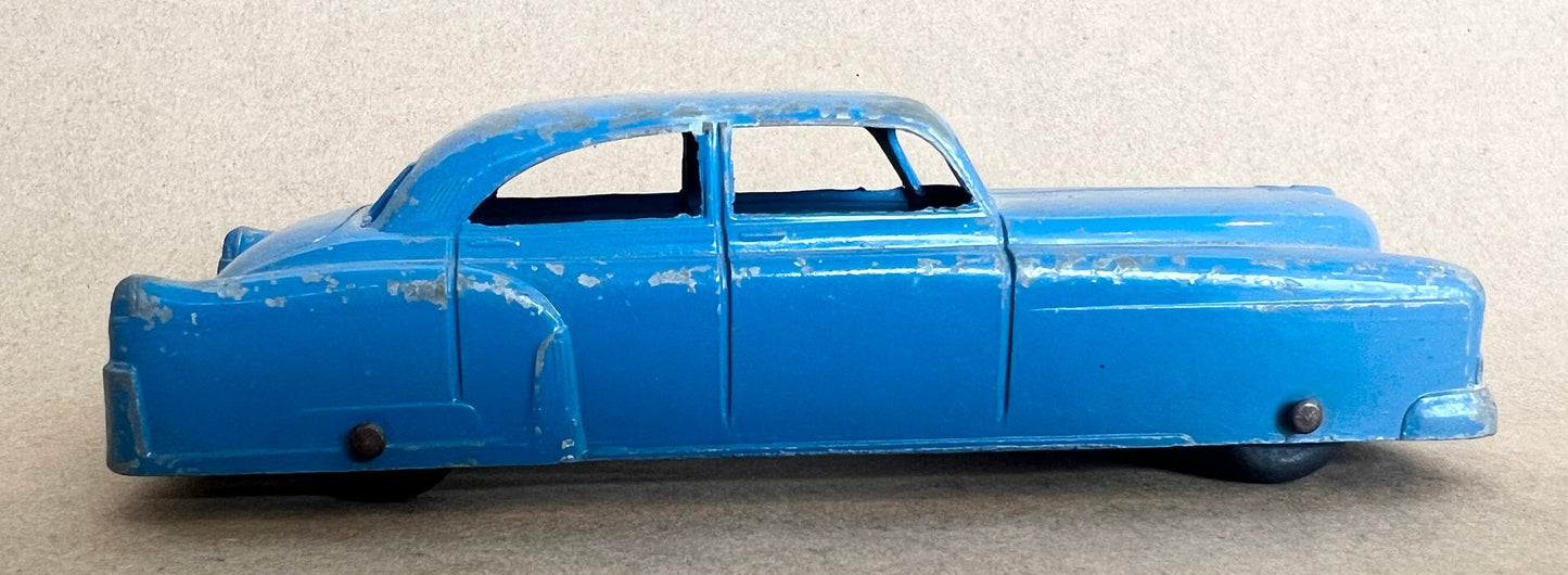 1948 GM Cadillac- Tootsie Toy- 6" long tootsie toy Cadillac - 1:43 Blue Cadillac - All Paint and Tires Original - Played with condition