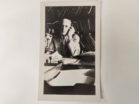 1929 Photo of A Man Named Ray on Phone Call - Man in Black and white Photo with round glasses - Perfect lighting to high light subject-